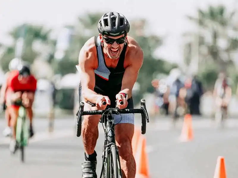 Cyclist wearing sunglasses during a race