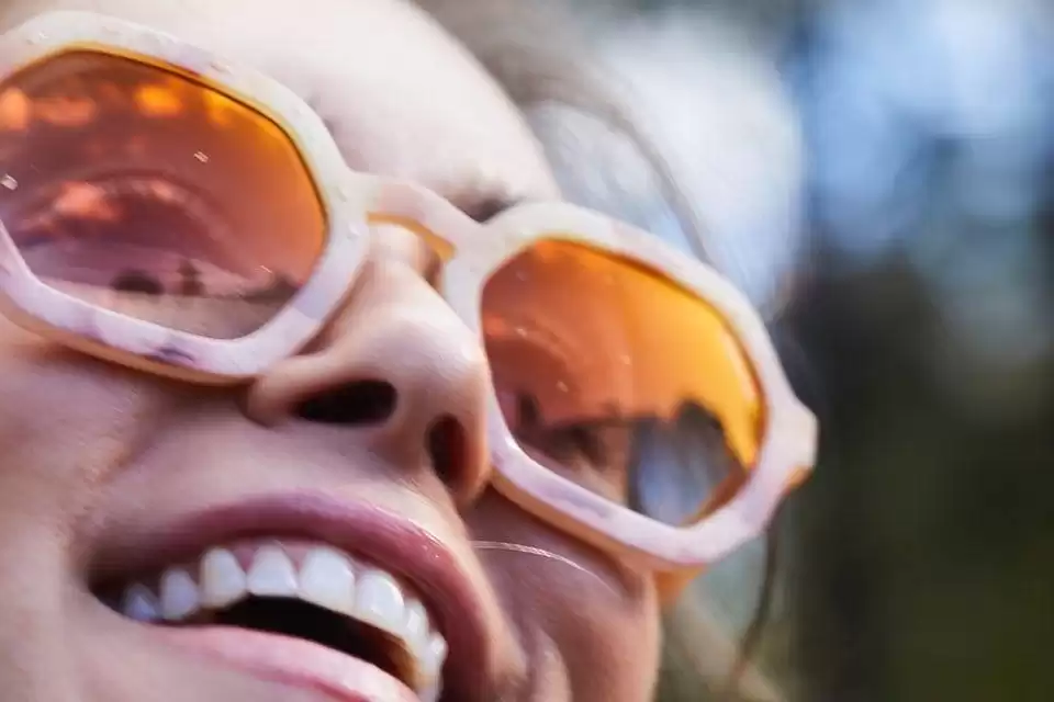 Woman wearing sunglasses Woman wearing sunglasses