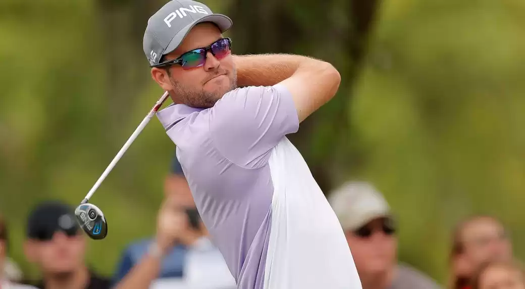 Man in a golf course wearing sunglasses Man in a golf course wearing sunglasses
