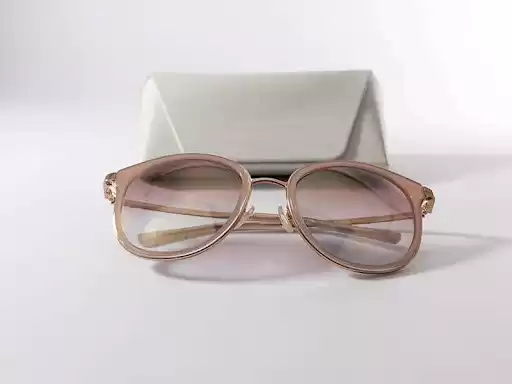 Rose designer sunglasses and white case Rose designer sunglasses and white case