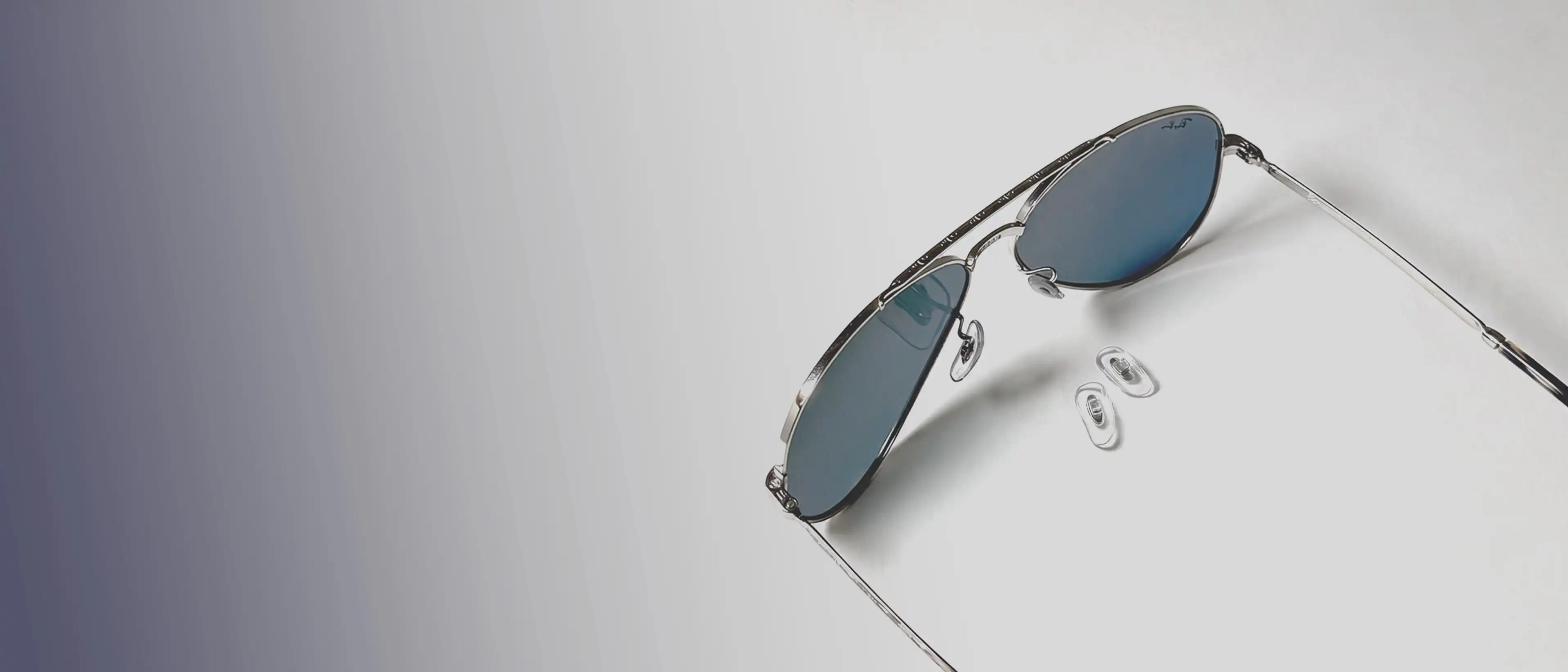 Screws being tightened on a metal sunglass frame Screws being tightened on a metal sunglass frame