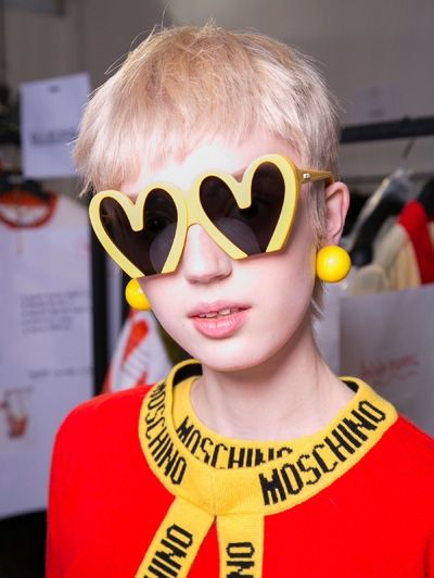 Model Wearing Heart Shaped Designer Sunglasses Moschino