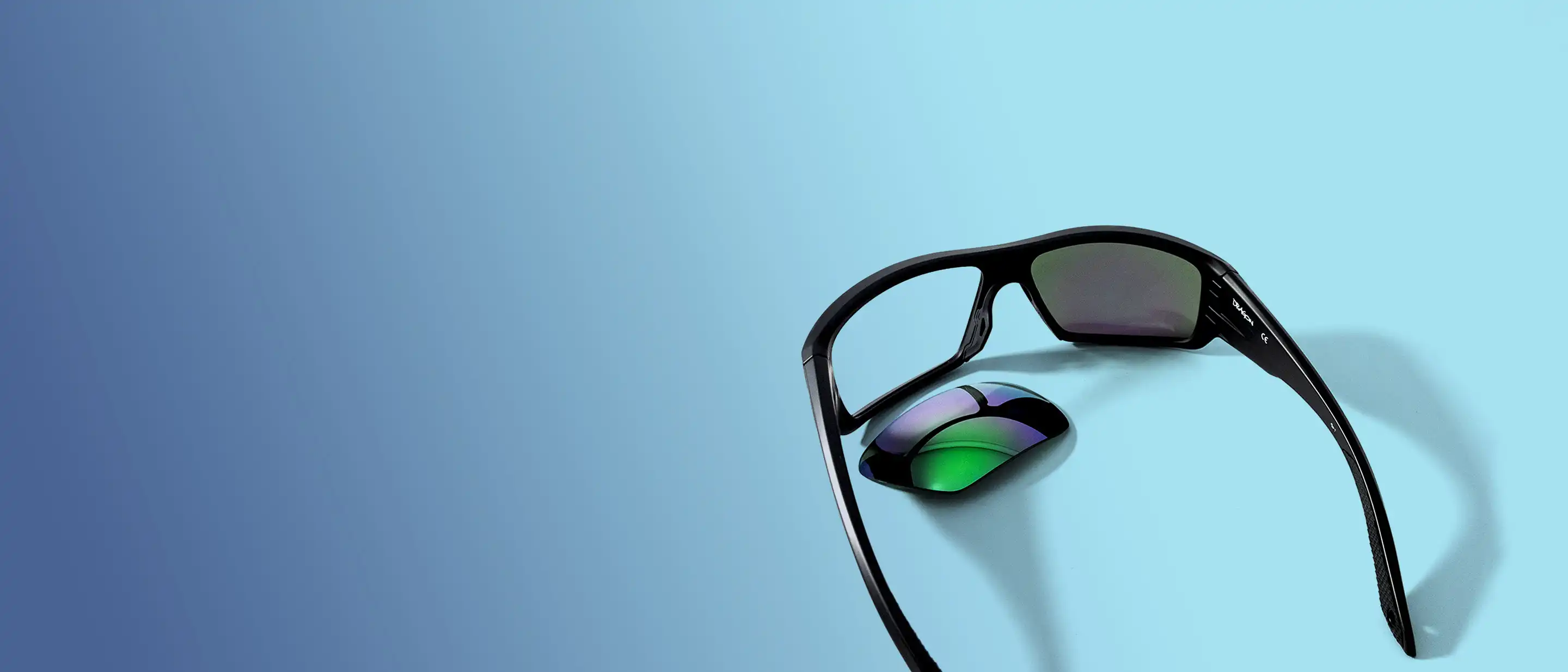Sunglasses and one green purple lens as replacement